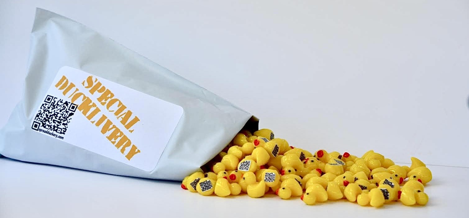 Spread Duckery's Special Ducklivery package with Spread Duckery mini ducks spilling out #spreadduckery #getducked